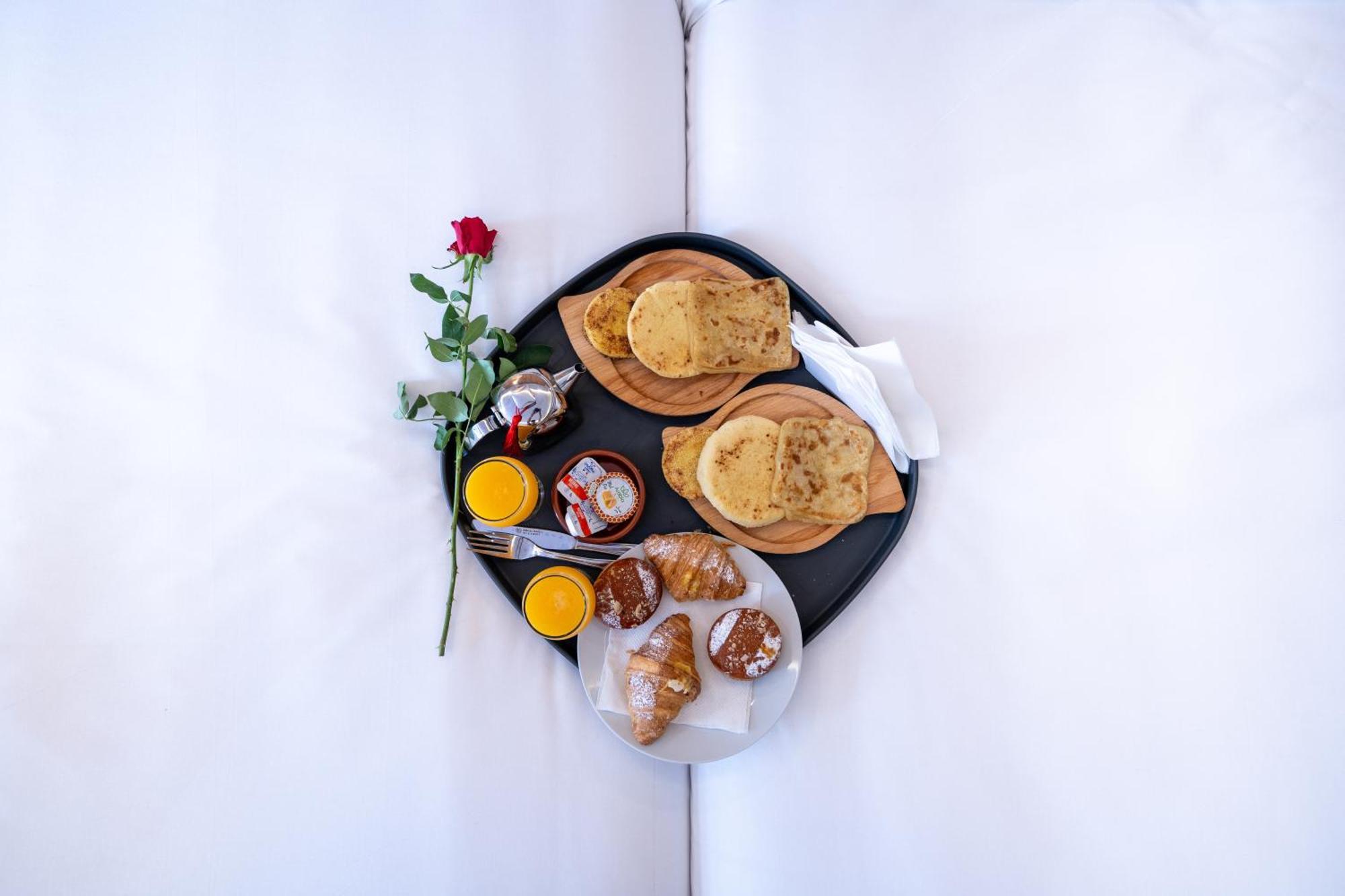 Unico Hotel Maarif Casablanca Buitenkant foto